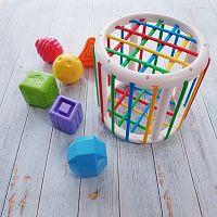 Игрушка-сортер для малышей из разноцветных резиночек, круглая основа 1+ IQS077569886 iQSclub магазин настольных и развивающих игр